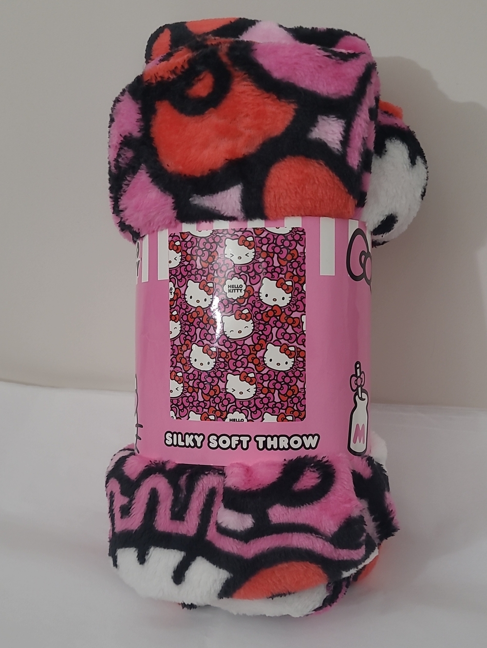 Hello Kitty More Bows Plush Throw Blanket — Pink, Red, White, Black